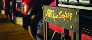 Chaney truck reads "Lights for Safety"